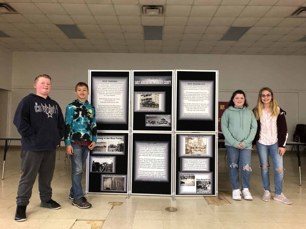 Students with historical exhibit